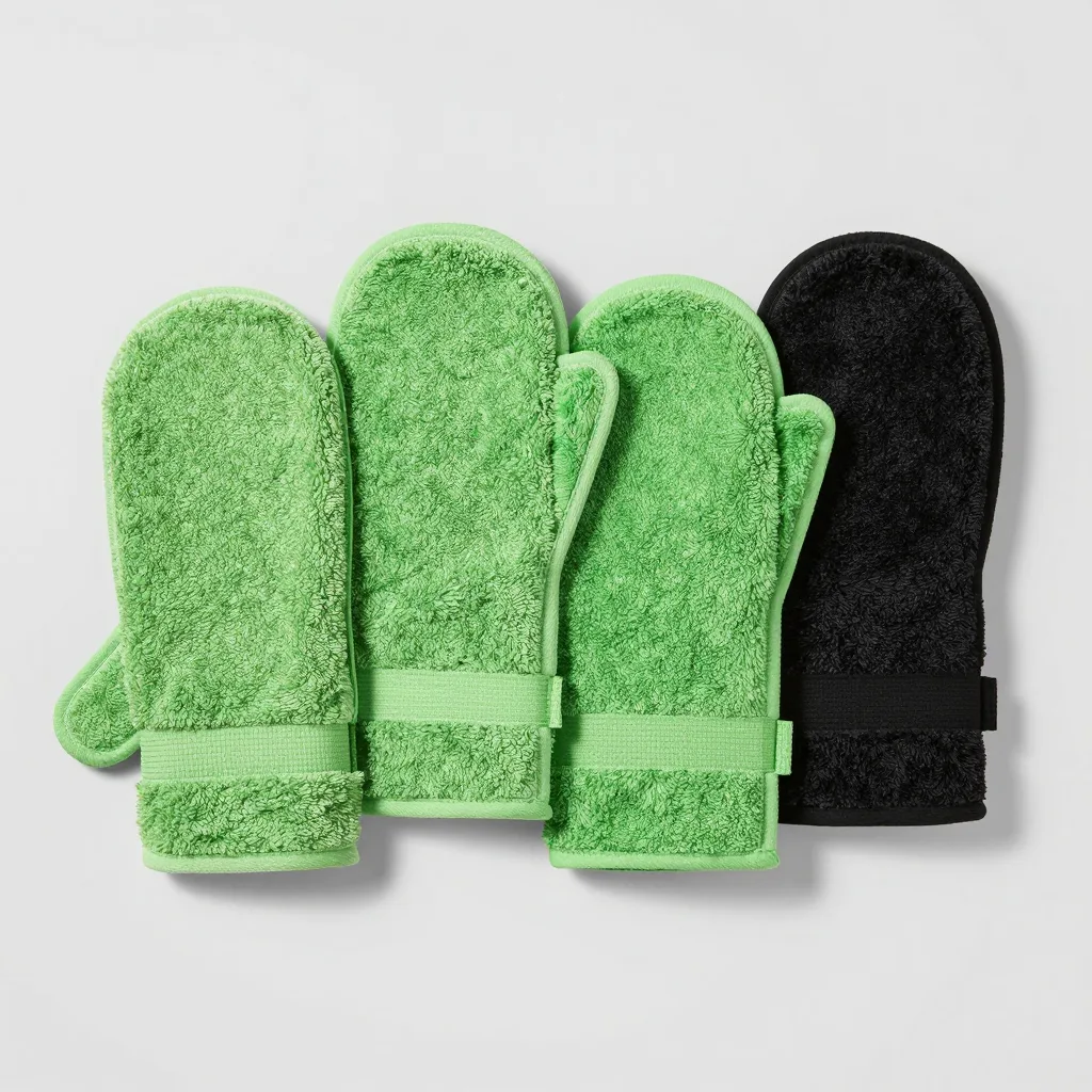 Five Italy towel mitts in green and black on a light background